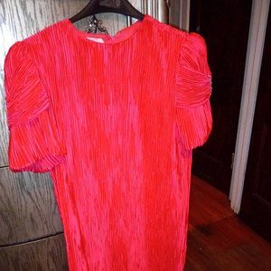 Hot pink 🩷 dress with rhinestones on the sleeves